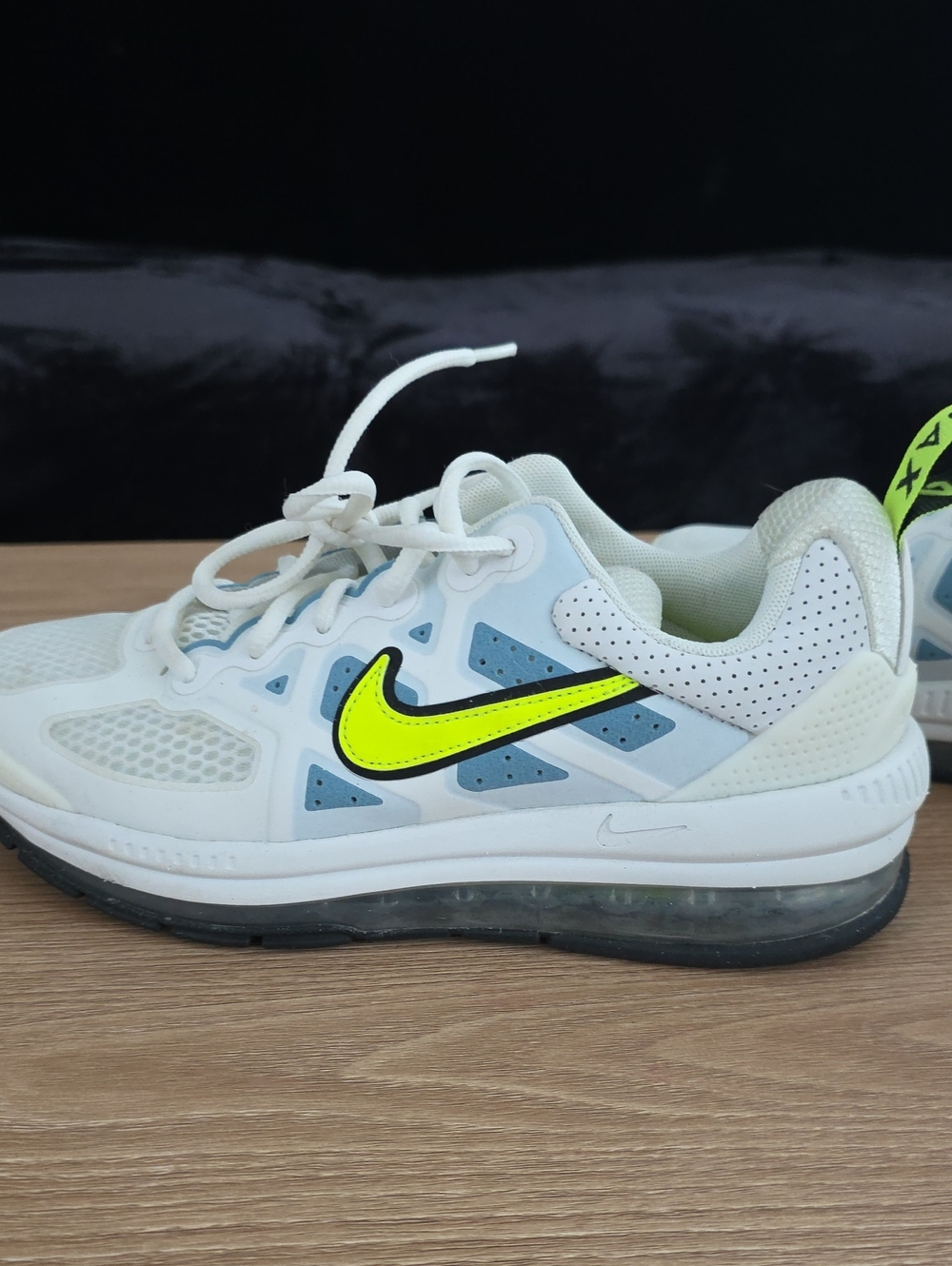 Nike Kids White Sneakers with Neon Yellow Swoosh and Blue Accents